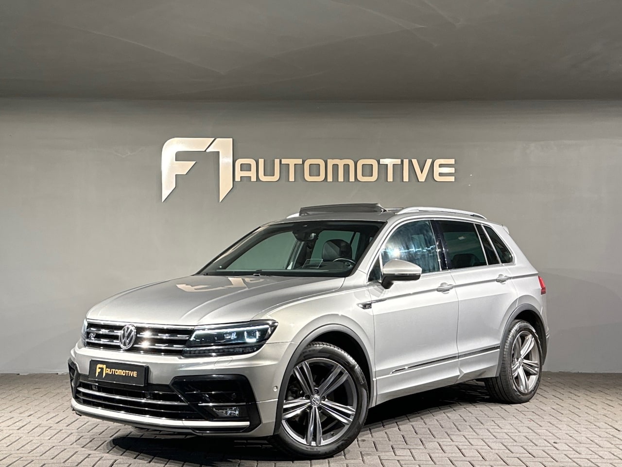 Volkswagen Tiguan - 1.4 TSI 4M Highline R Line Pano|Memory|HuD - AutoWereld.nl