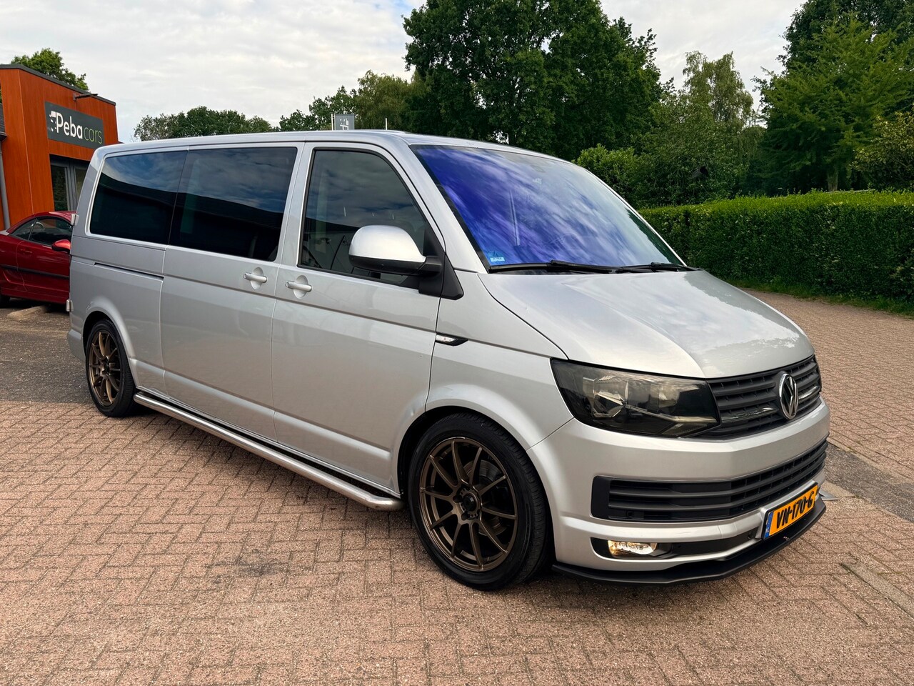 Volkswagen Transporter Caravelle - 2.0 TDI L2H1 Highline/Dc/6 persoons/Marge/Luxe Uitvoering!!! - AutoWereld.nl