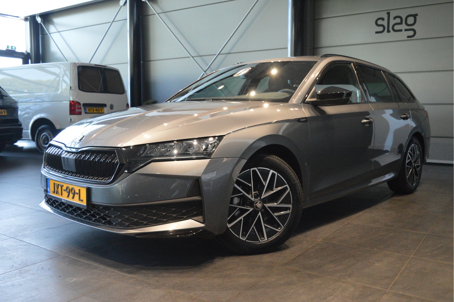 Skoda Octavia Combi - 2.0 TDI Sportline navi camera led trekhaak 150 pk !! - AutoWereld.nl