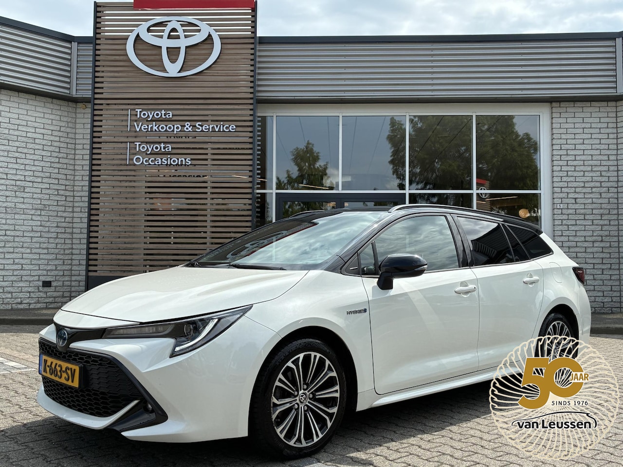 Toyota Corolla Touring Sports - 1.8 HYBRID STYLE BI-TONE STOEL/STUURVERW EL-ACHTERKLEP HEAD-UP APPLE/ANDROID CLIMA AD-CRUI - AutoWereld.nl