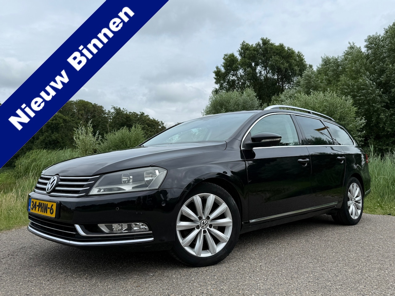 Volkswagen Passat Variant - 2.0 TDI Highline BlueMotion Automaat | Leder | Camera | Navi | Clima | Stoelverwarming | P - AutoWereld.nl