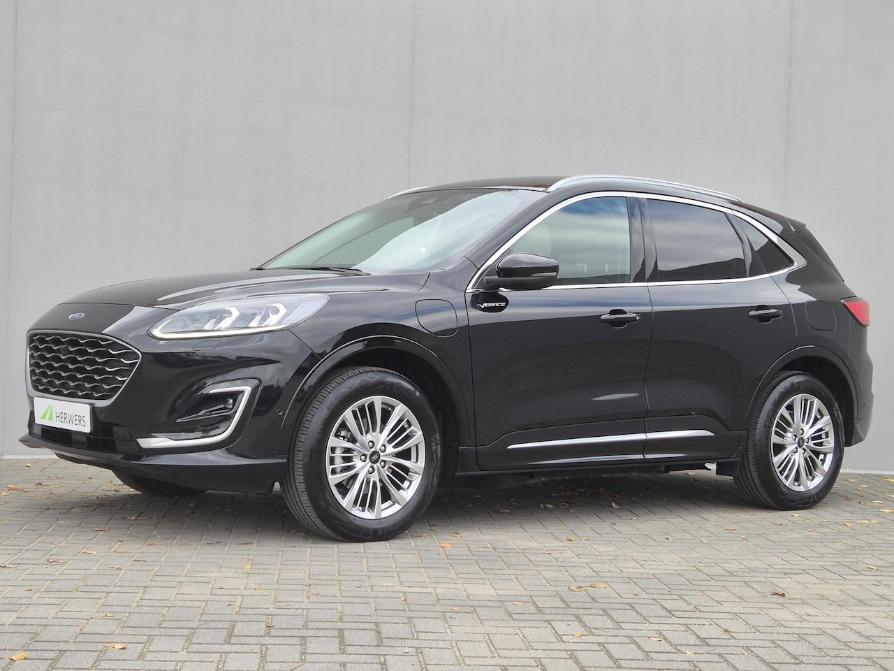 Ford Kuga - 2.5 PHEV Plug-in Vignale Automaat / Fabrieksgarantie tot 04-2026 / Driver Assistance Pack - AutoWereld.nl