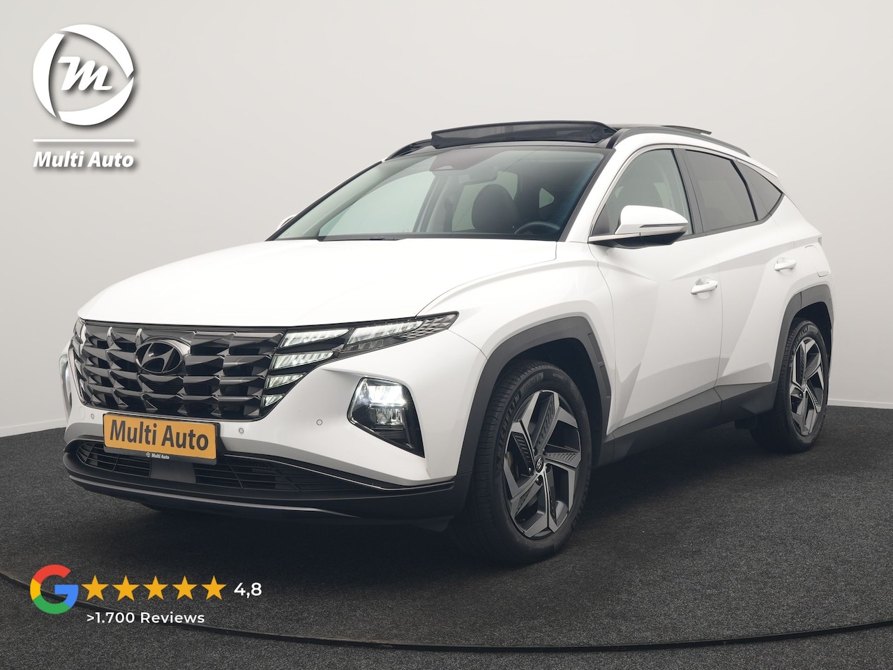 Hyundai Tucson - 1.6 T-GDI Comfort Smart 4WD PHEV 265pk | Panodak | Adaptive Cruise | Camera | Krell Audio - AutoWereld.nl