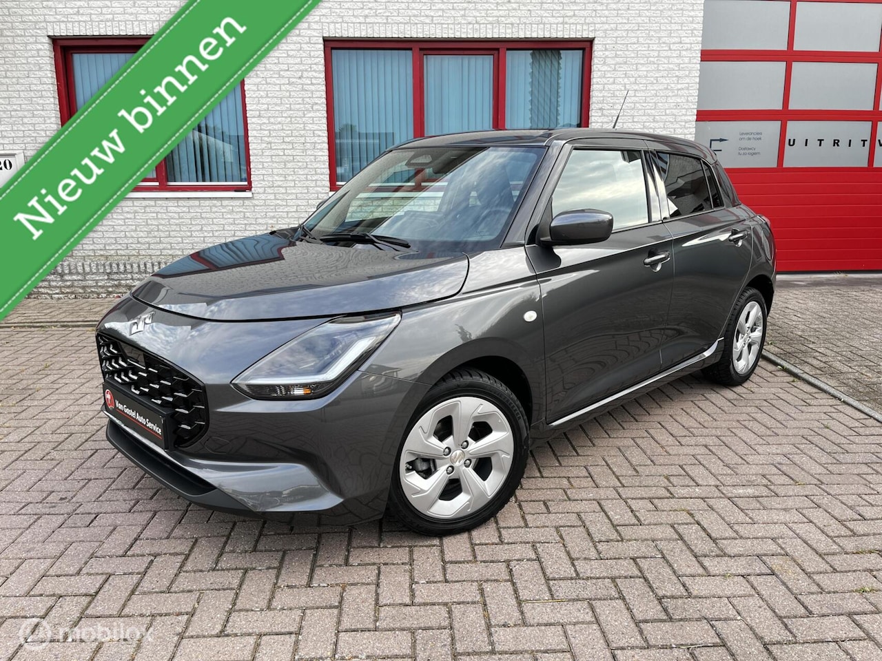 Suzuki Swift - 1.2i Smart Hybrid AUTOMAAT/NAVI/CAMERA - AutoWereld.nl