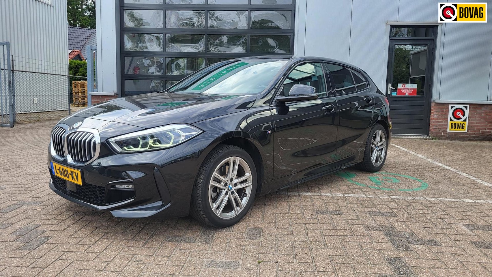 BMW 1-serie - 118i High Executive sport-Line - AutoWereld.nl