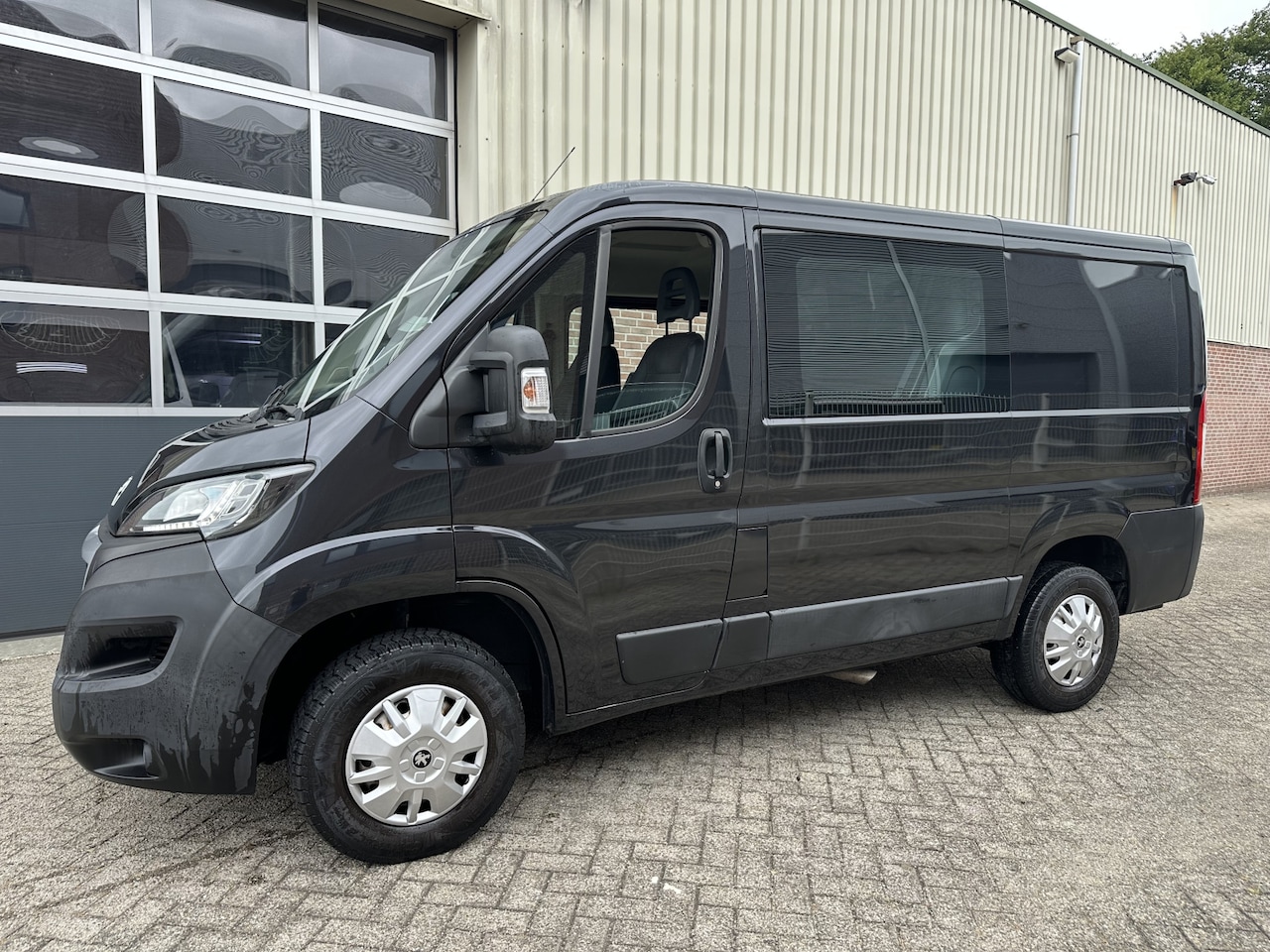Peugeot Boxer - 330 2.0 BlueHDI L1H1 Pro DC Airco,Cruise,Navi,Camera,Pdc,Enz - AutoWereld.nl
