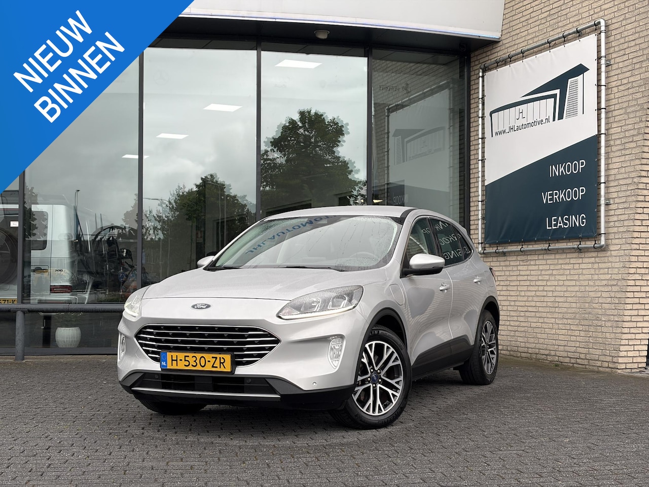 Ford Kuga - 2.5 PHEV Titanium 2.5 PHEV Titanium - AutoWereld.nl