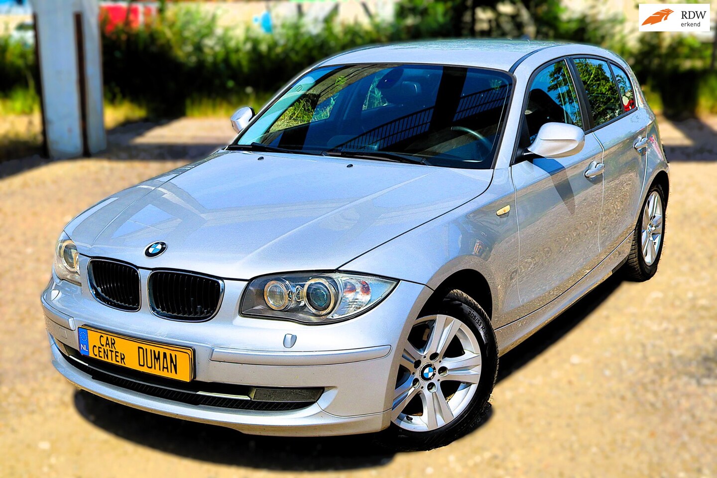 BMW 1-serie - 118i High Executive Clima Xenon Navi Stoelverwarming - AutoWereld.nl