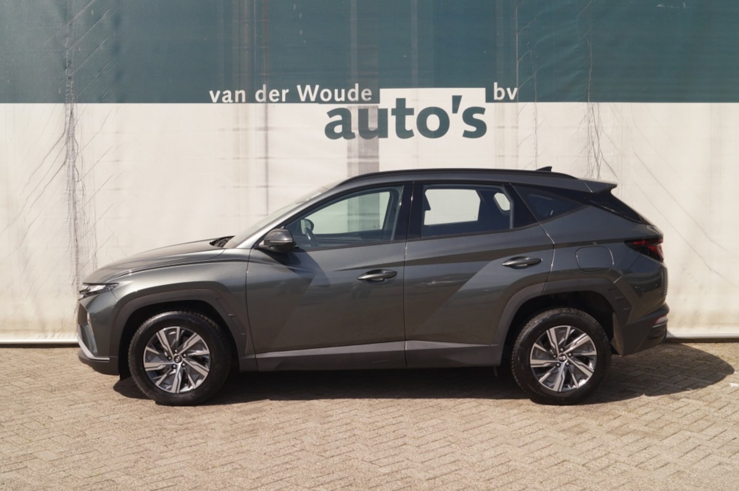 Hyundai Tucson - 1.6 T-GDI HEV i-Motion -NAVI-ECC-CAM-TREKHAAK- - AutoWereld.nl