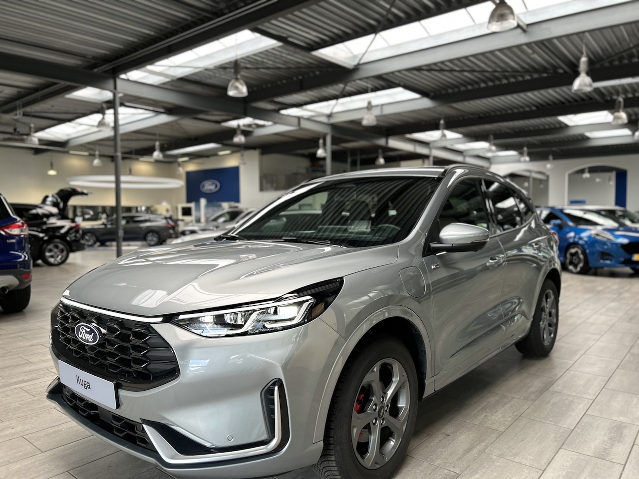 Ford Kuga - 2.5 PHEV 243 pk ST-Line X I AGR stoelen | Adapt Cruise I Winter Pack | B&O | 360° Camera I - AutoWereld.nl