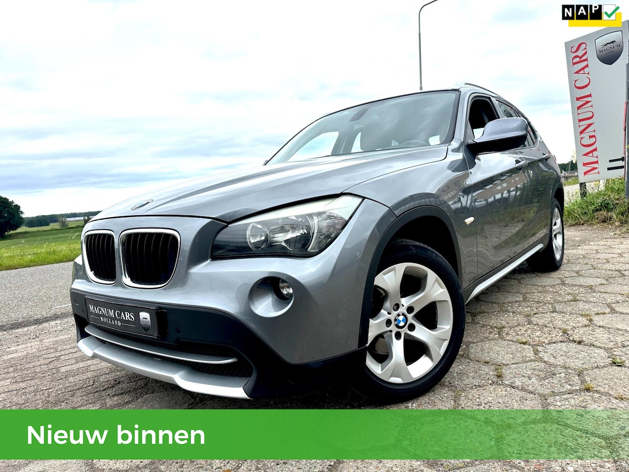 BMW X1 - 18i 5D NAP Airco Trekhaak Navi Parkeersensoren Elek.ramen APK Velgen - AutoWereld.nl