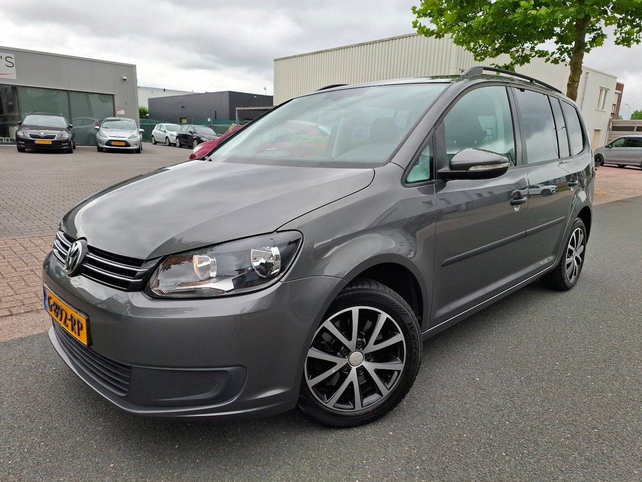 Volkswagen Touran - 1.4 TSI Comfortline 7 PERSOONS/CLIMA/CRUISE/NAVI! - AutoWereld.nl