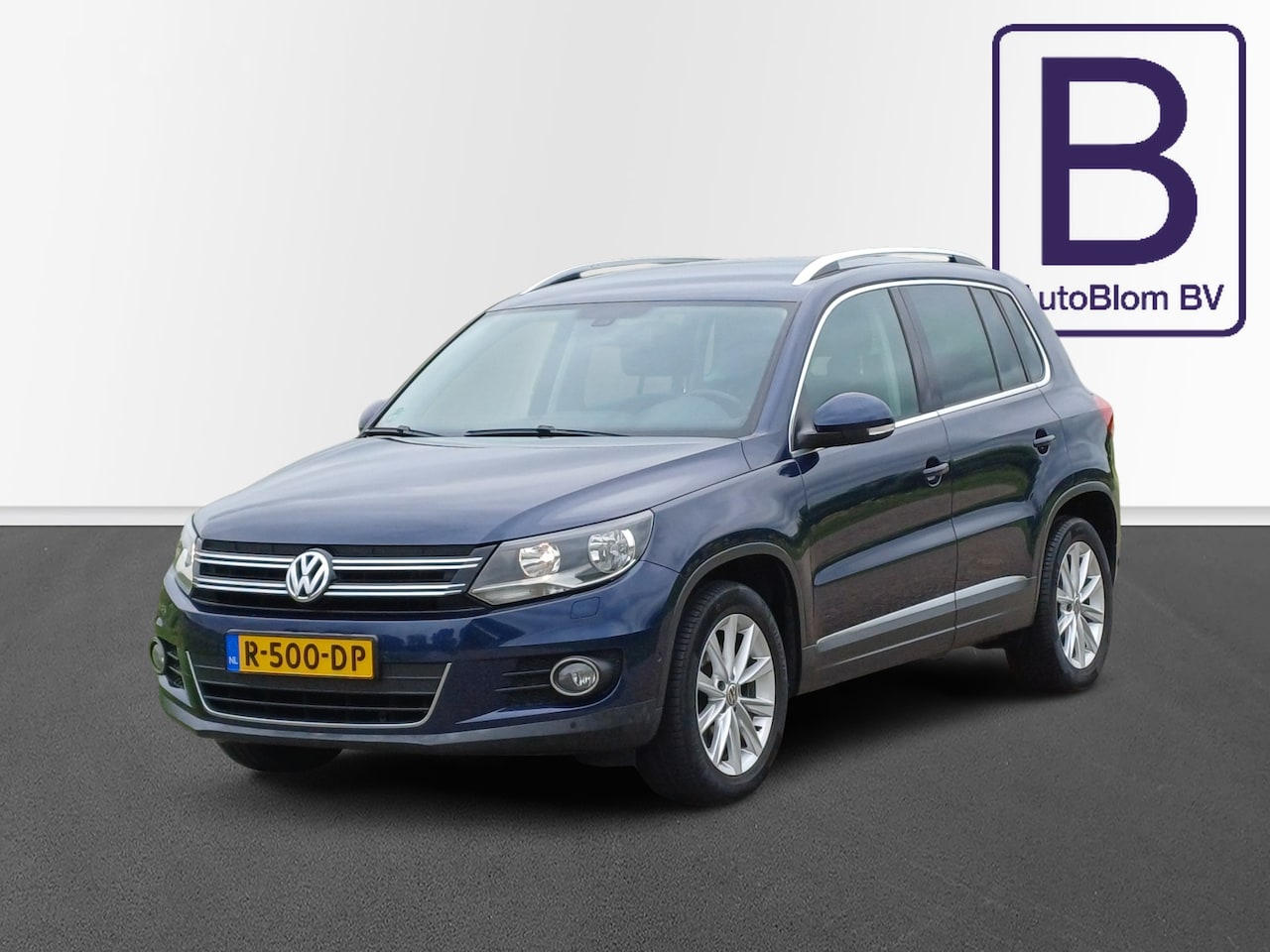 Volkswagen Tiguan - 1.4 TSI Sport&Style /Nette auto!/Goed onderhouden!/Leder/Navi/Cruise/Clima/ - AutoWereld.nl