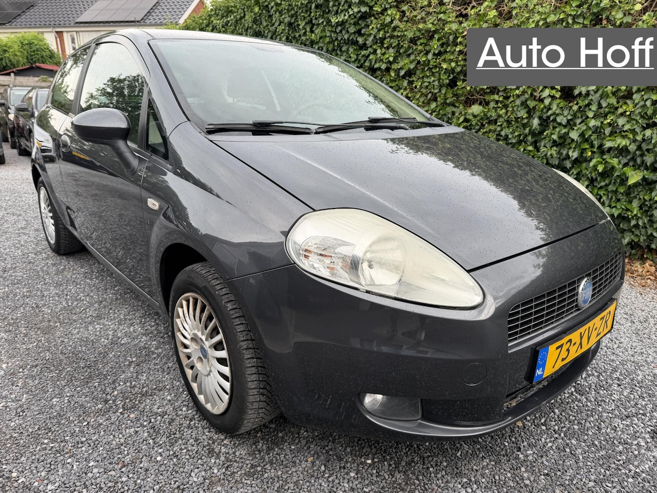Fiat Grande Punto - 1.4 Dynamic | Airco | Cruise Control | Elekt. Ramen | Trekhaak | APK tot 03-02-2027! - AutoWereld.nl