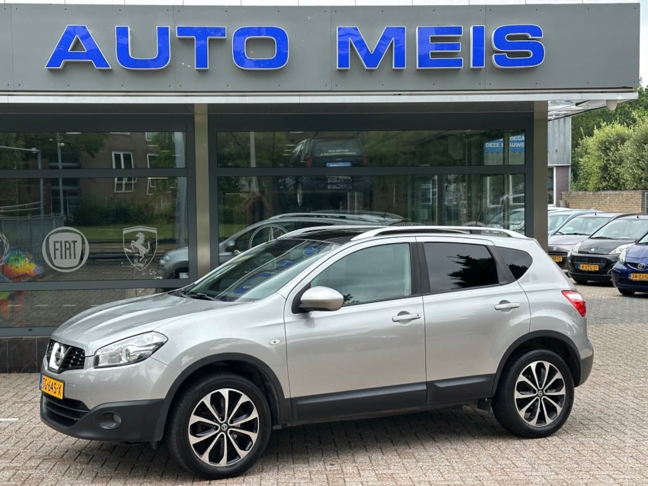 Nissan Qashqai - 1.6 Acenta Navi Camera Cruise Airco Trekhaak - AutoWereld.nl