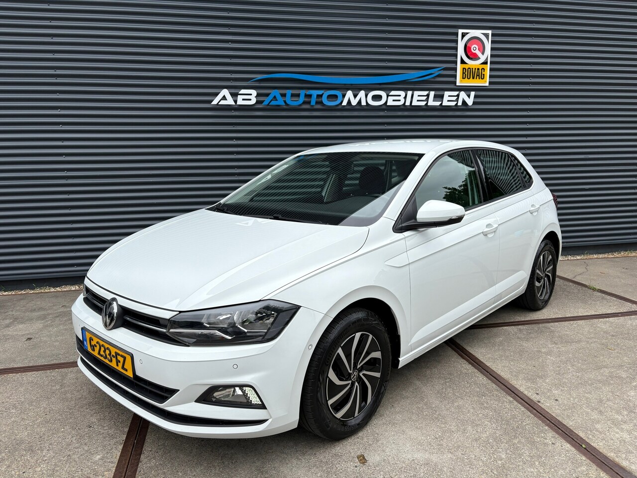 Volkswagen Polo - 1.0 TSI Comfortline Business AUTOMAAT/ CAMERA/ PARK ASSIST - AutoWereld.nl