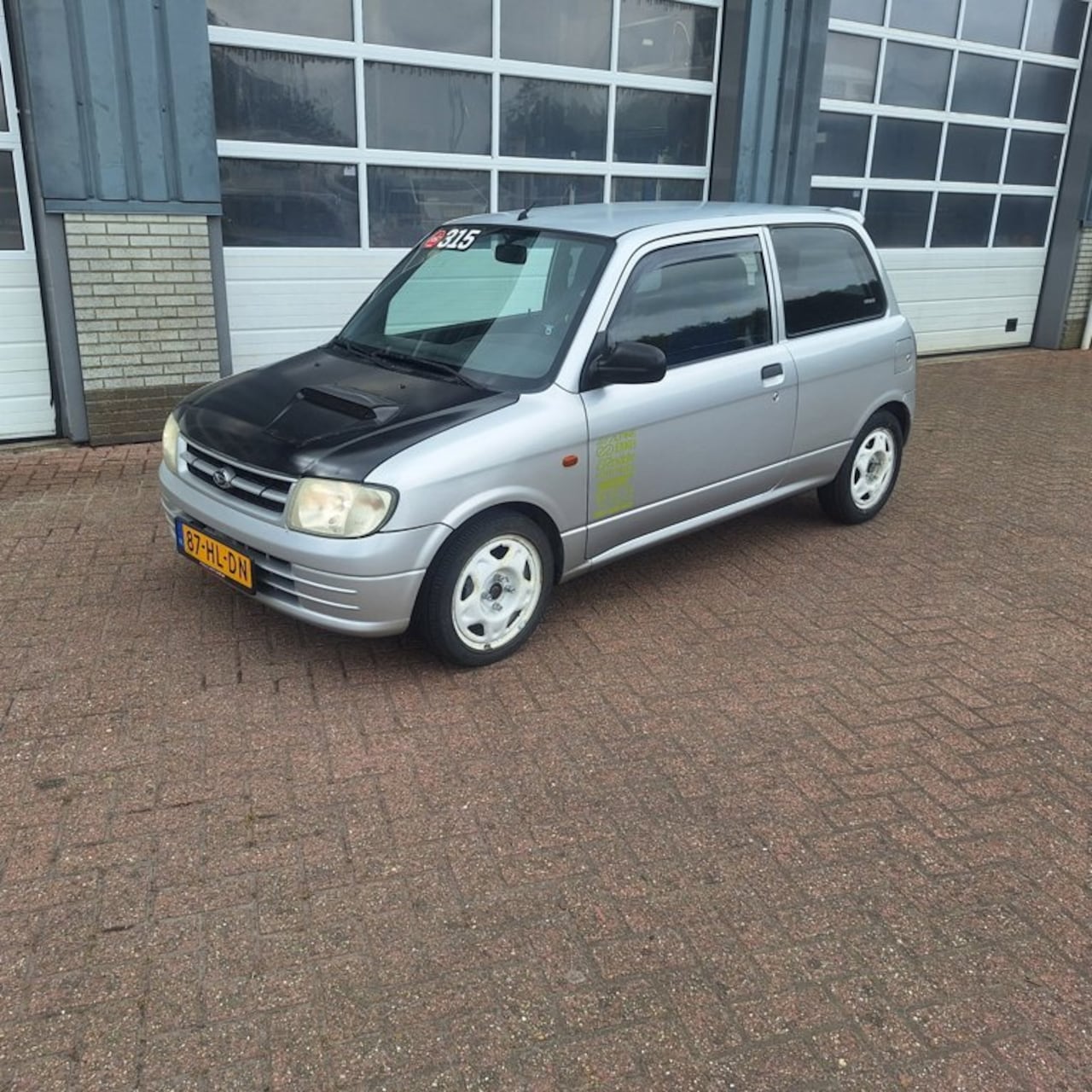 Daihatsu Cuore - 1.0-12V STi 1.0-12V STi - AutoWereld.nl