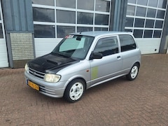 Daihatsu Cuore - 1.0-12V STi
