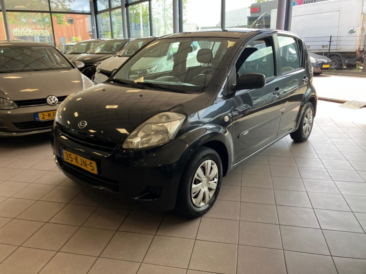 Daihatsu Sirion 2 - 1.0-12V Premium AIRCO APK 11-27 BJ 2010 !!! - AutoWereld.nl