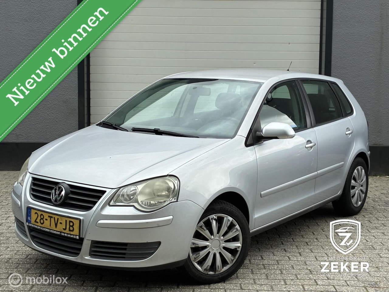 Volkswagen Polo - 1.2-12V Sportline / airco / cruise / - AutoWereld.nl