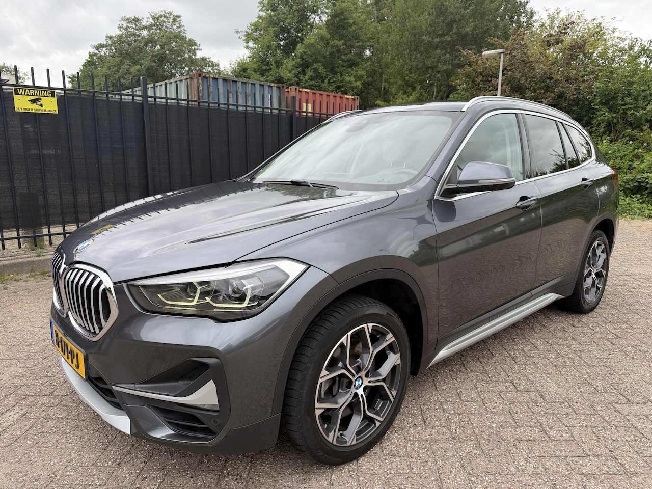 BMW X1 - sDrive20i VDL Nedcar Edition LED/Sportleer/HU/Stoelverw/Leer/Navi - AutoWereld.nl