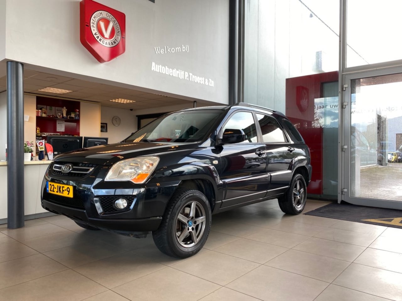 Kia Sportage - 2.0 CVVT X-ecutive 2.0 CVVT X-ecutive,Navigatie,Climate&Cruisecontrol,Trekhaak,Elektrischpakket,Achteruitrijs - AutoWereld.nl