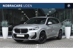 BMW X1 - sDrive18i M Sport Automaat / M Adaptief onderstel / Sportstoelen / Comfort Access / Achter