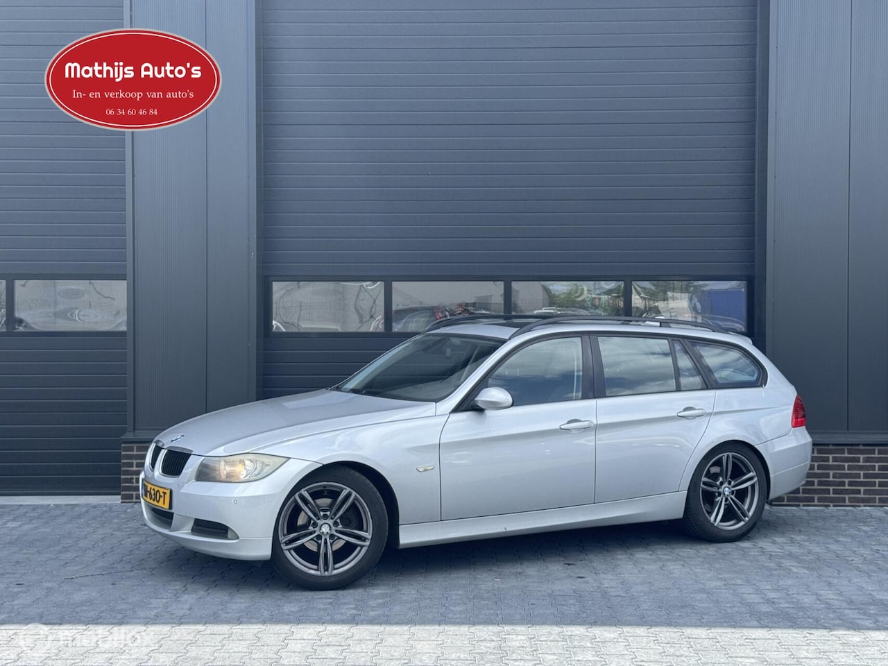 BMW 3-serie Touring - 318i High Executive Pano Trekhaak! Navi! Nieuwe APK! - AutoWereld.nl