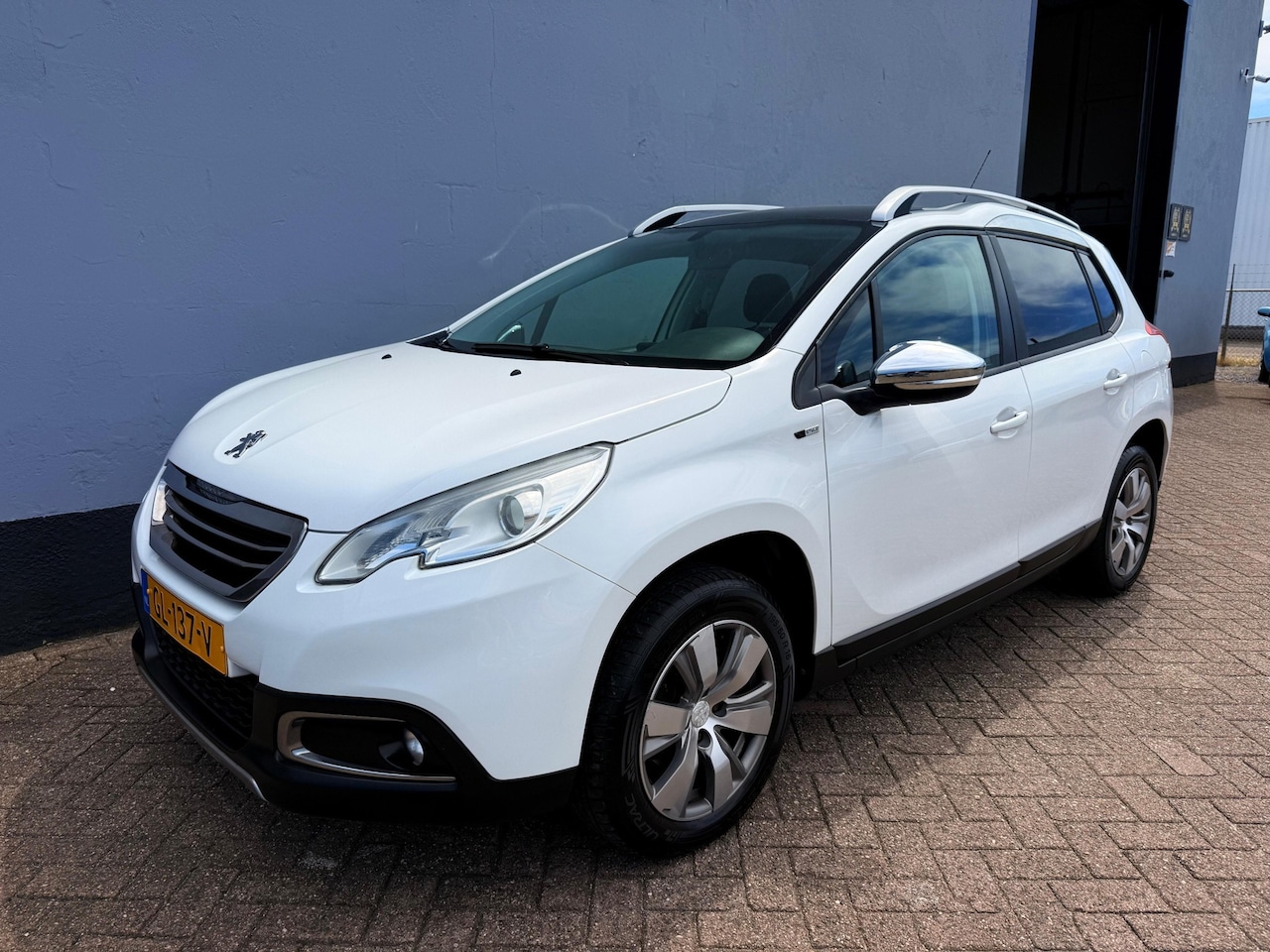 Peugeot 2008 - 1.2 PureTech Style - Panorama Dak - AutoWereld.nl