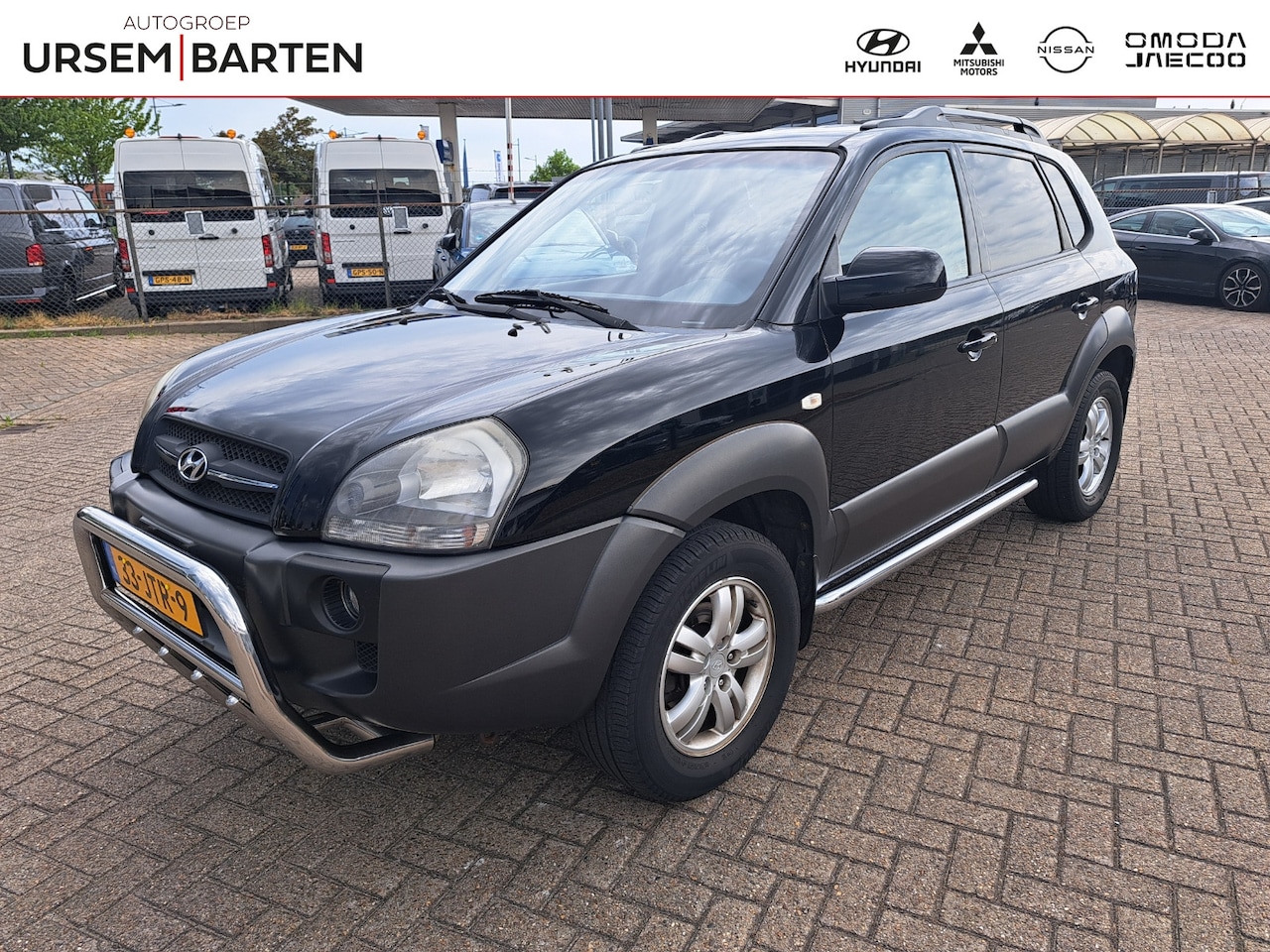 Hyundai Tucson - 2.0i Style Cross | Airco | Cruise control - AutoWereld.nl