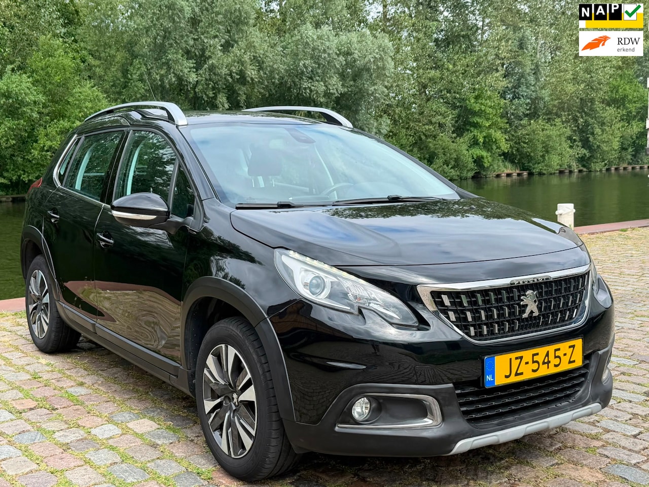 Peugeot 2008 - 1.2 PureTech Allure Automaat 1e eigenaar dealer onderhouden achteruit camera airco cruis c - AutoWereld.nl
