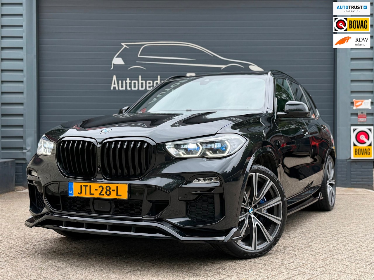 BMW X5 - M50i High Executive | B&W| Pano | Laser | M-stoelen - AutoWereld.nl