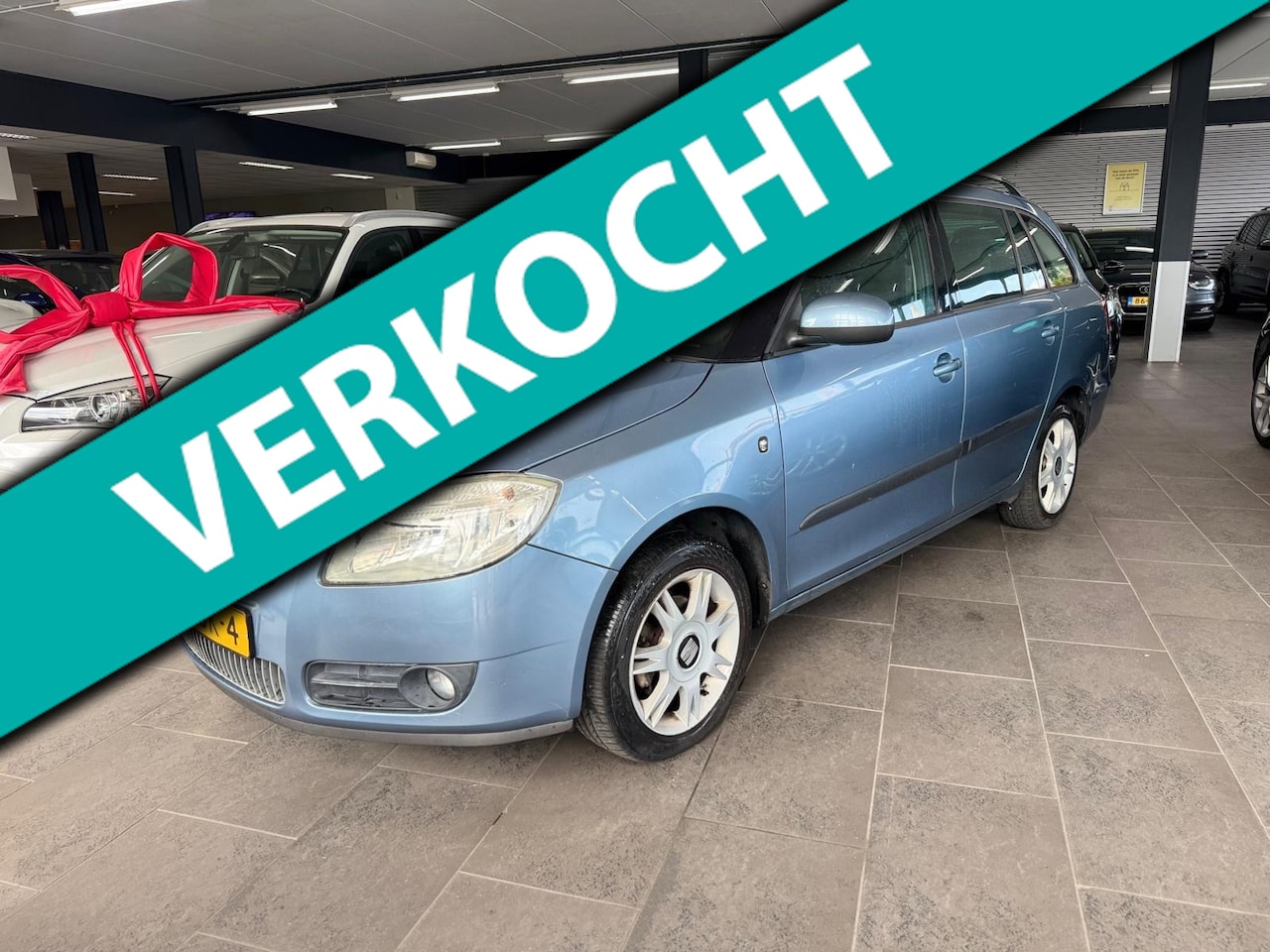 Skoda Fabia Combi - 1.4-16V Ambiente airco cruise controle lm-velgen elektrische pakket parkeersensoren trekha - AutoWereld.nl