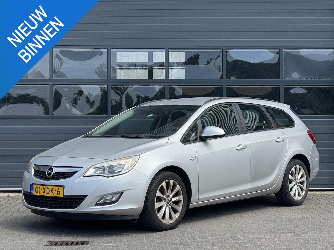 Opel Astra Sports Tourer - 1.4 ANNIVERSARY EDITION I MEENEEMPRIJS I APK TOT 03-2027 - AutoWereld.nl