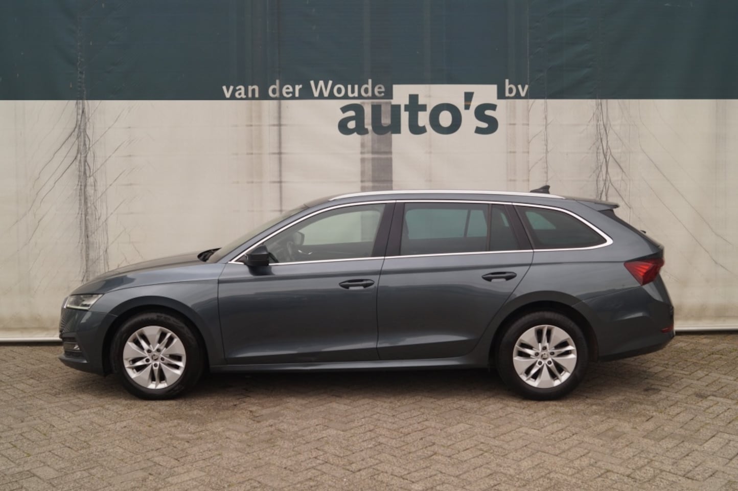 Skoda Octavia Combi - 1.6 TDI 115pk Ambition -NAVI-ECC-PDC- - AutoWereld.nl