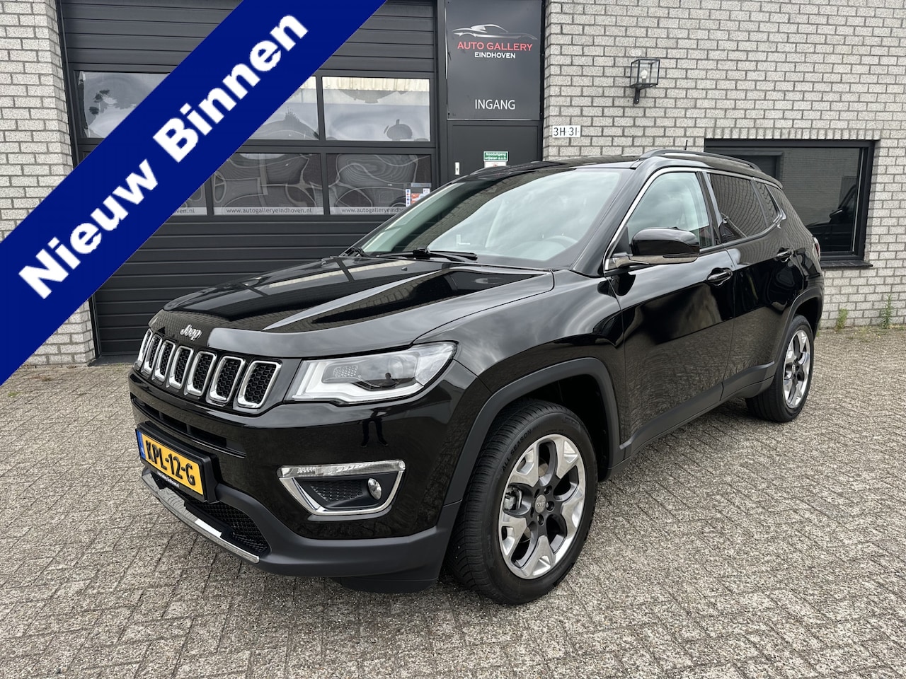 Jeep Compass - 1.4 Multi Air LTD 4x4 *NAVI*CAMERA*CRUISE*LEDER*AIRCO*LMV - AutoWereld.nl