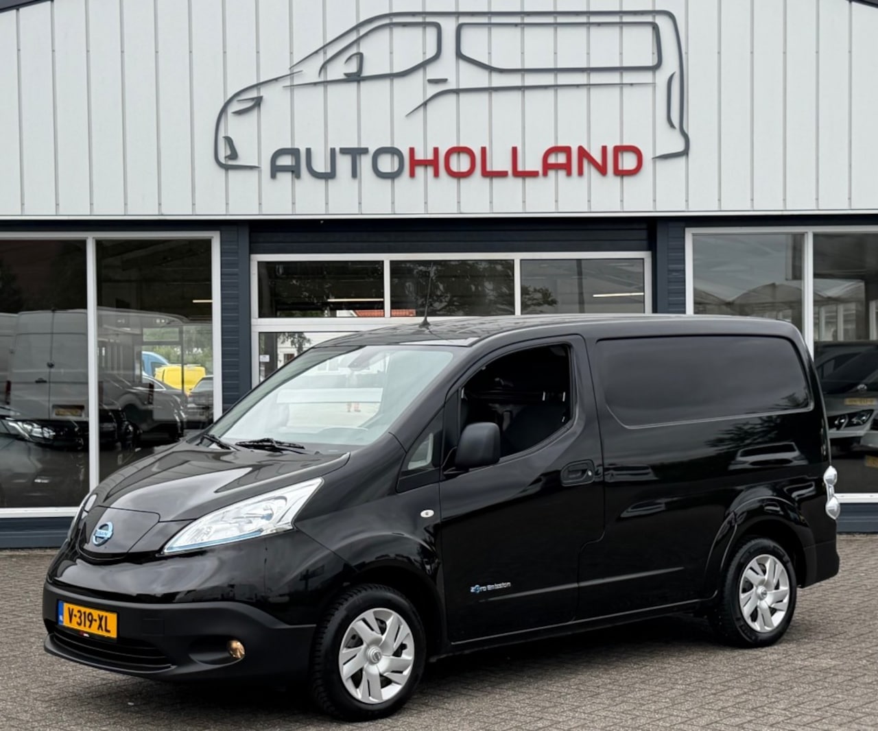 Nissan e-NV200 - ZERO EMISSIE 40KWH 80KW 120PK AIRCO/ TREKHAAK/ NAVIGATIE/ CRUISE CONTROL/ CAMERA/ 100% DEA - AutoWereld.nl