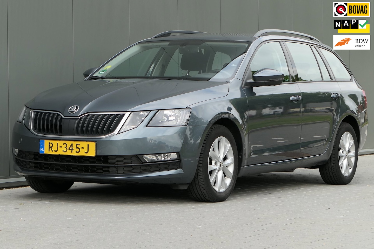 Skoda Octavia Combi - 1.6 TDI Greentech Ambition Business NAP Cruise Navi Trekhaak - AutoWereld.nl