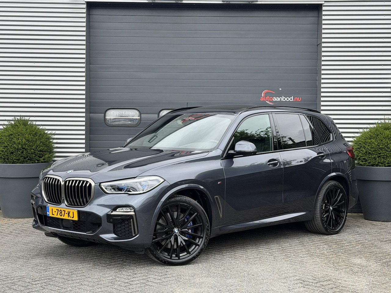 BMW X5 - M50i High Executive | M-Sport | Panoramadak | 360* Camera | Skylounge | Laser | Elektrisch - AutoWereld.nl