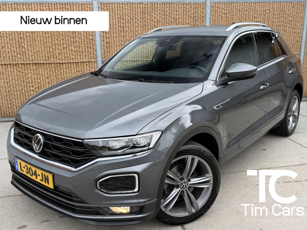 Volkswagen T-Roc - 1.5 TSI Sport Business R-line Automaat | LED verlichting | Stoelverwarming | Achteruitrijc - AutoWereld.nl