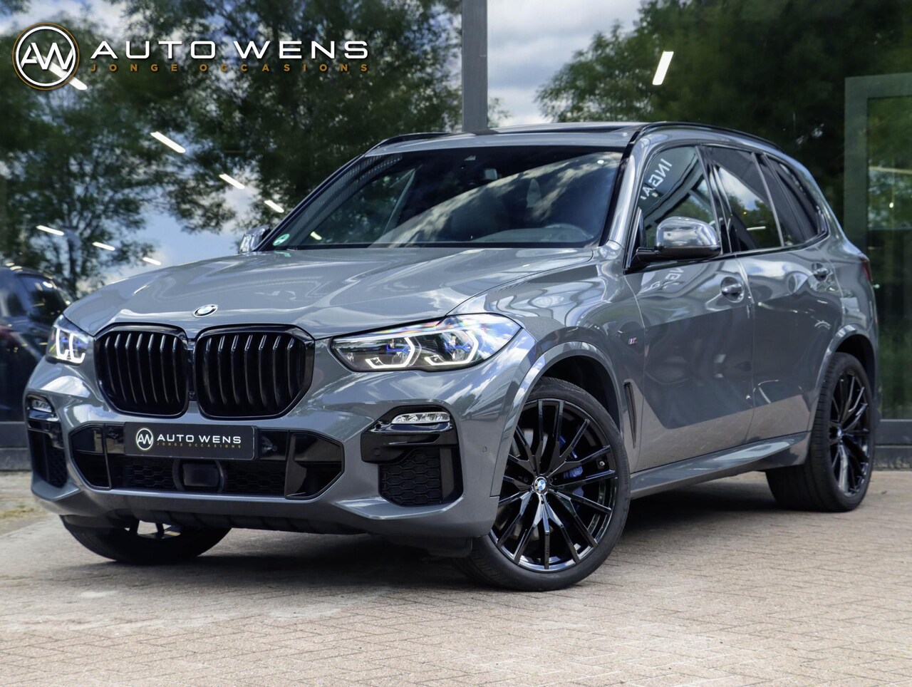 BMW X5 - M50i 4.4 530pk | Achterasbesturing | Laser | ACC | Sky Lounge | Grigrio Telesto - AutoWereld.nl