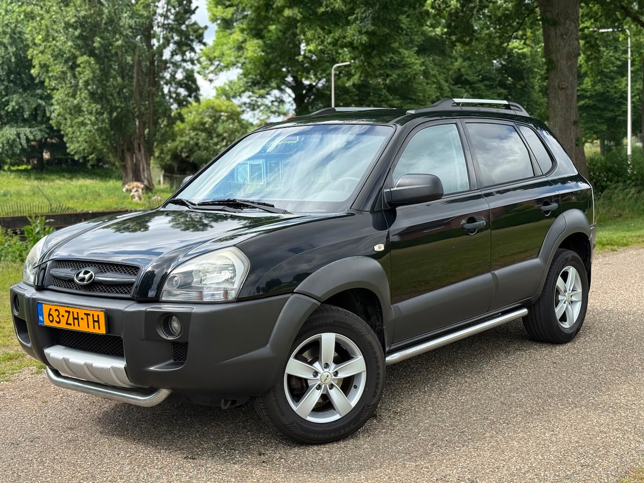 Hyundai Tucson - 2.0i Dynamic Cross|Airco|Trekhaak - AutoWereld.nl