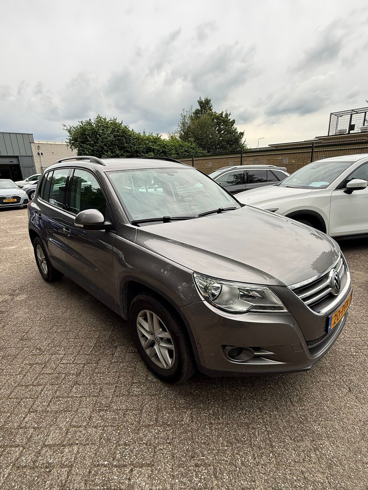 Volkswagen Tiguan - 1.4 TSI Comfort&Design 5deurs | Airco | Elek. Pakket | LM velgen | Trekhaak | Inruil mogel - AutoWereld.nl