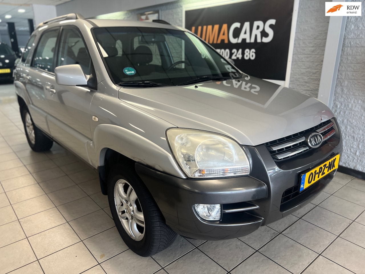 Kia Sportage - 2.0 CVVT Comfort | APK/2027 | Cruise | Airco | - AutoWereld.nl