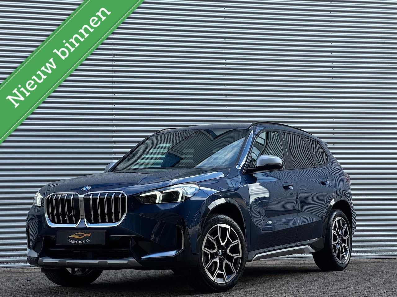 BMW X1 - sDrive18i X-Line /Leder/Aut/Keyless /Camera/stoelverwarming/Cruise/Carplay - AutoWereld.nl
