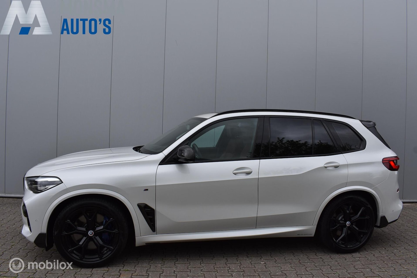 BMW X5 - xDrive40i M-Performance Mineralweiß Pano Nappa HUD Softclose H/K Luchtvering 21" LMV Elek. - AutoWereld.nl