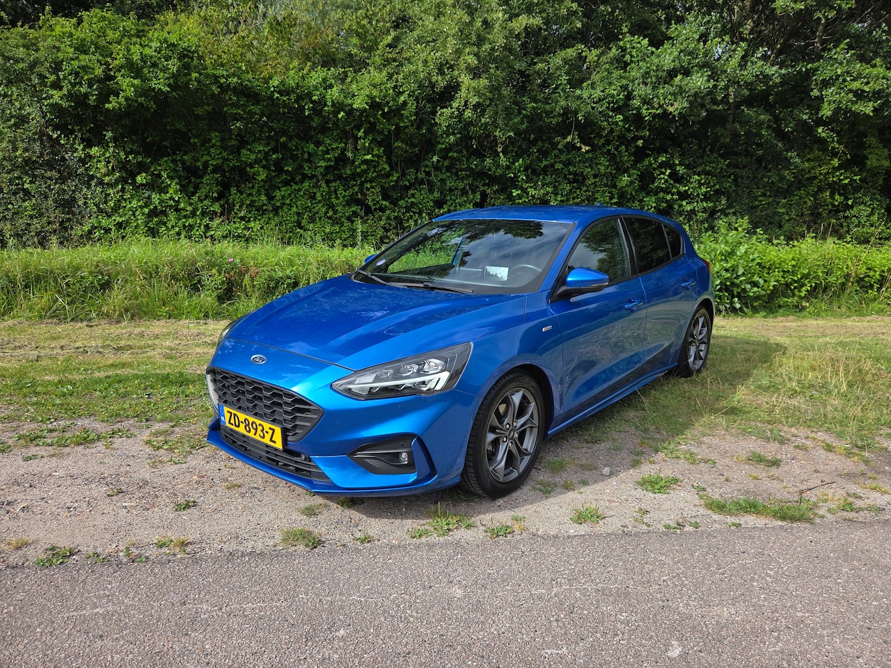 Ford Focus - 1.0 EcoBoost ST Line Business Ford Focus ST-Line 1.0 EcoBoost 125 PK | Desert Island Blue | Zeer compleet uitgerust | De - AutoWereld.nl