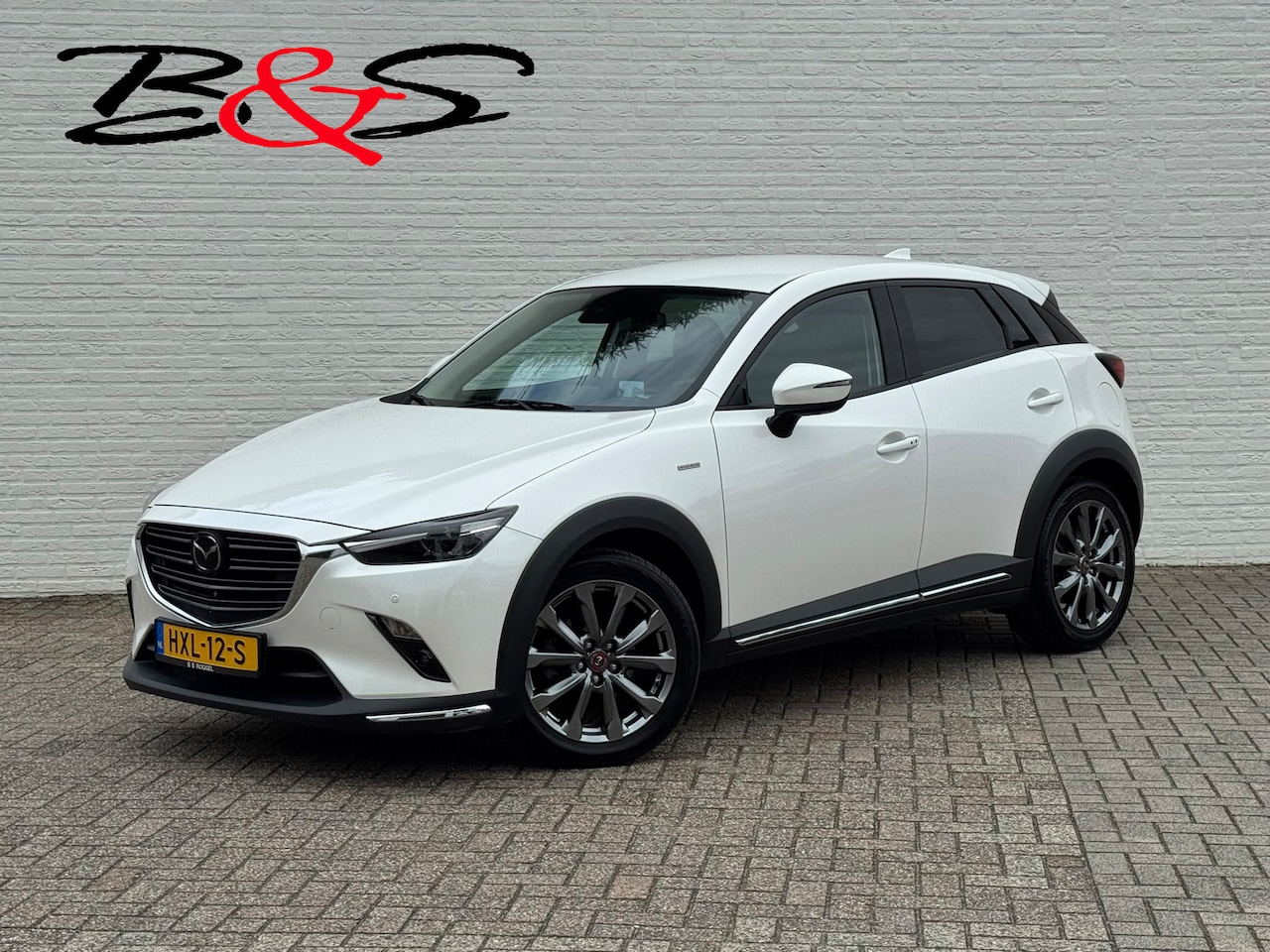 Mazda CX-3 - 2.0 SkyActiv-G 121 Signature Adaptive cruise Climate control Head-up display 360 camera BO - AutoWereld.nl