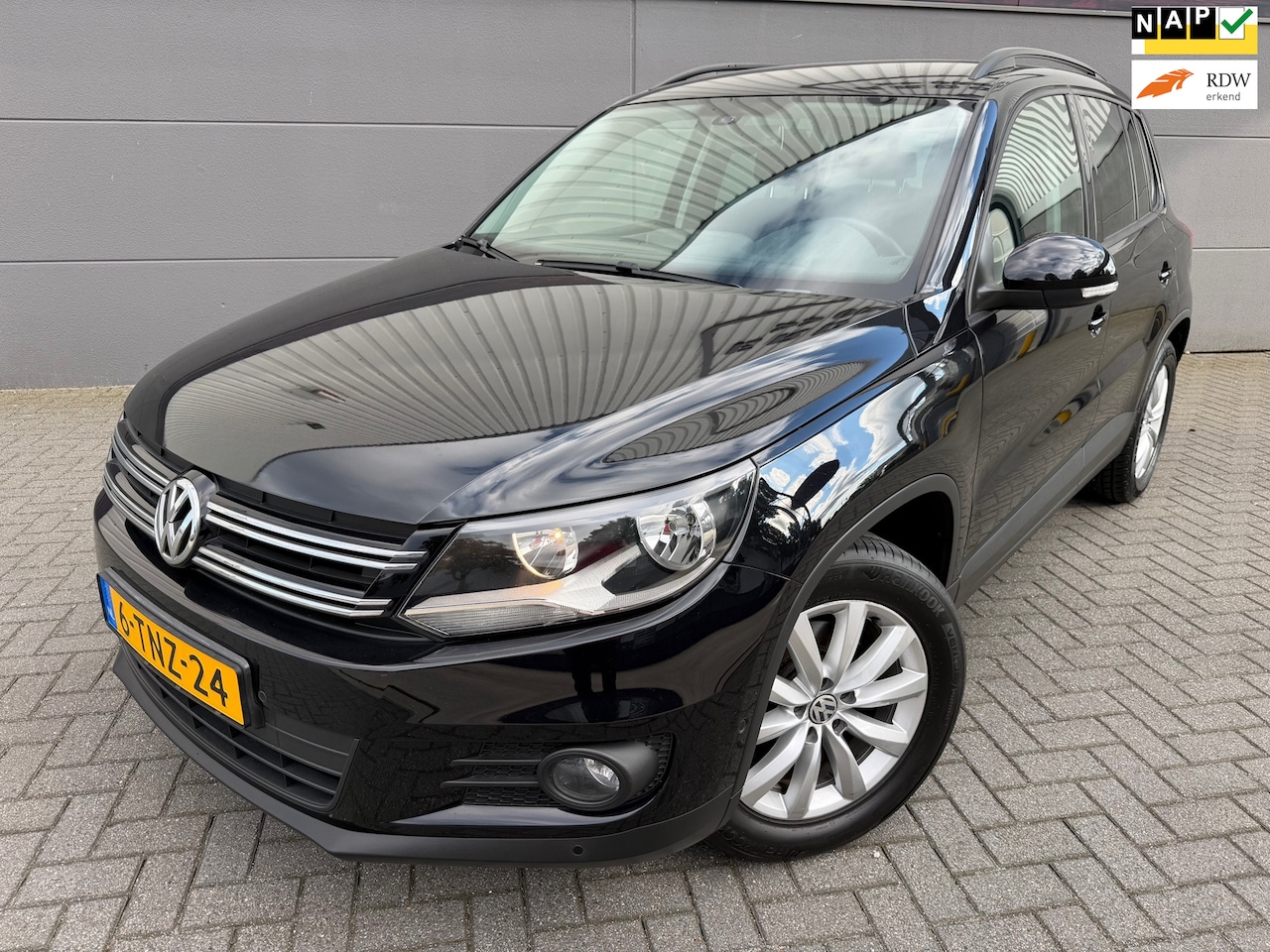 Volkswagen Tiguan - 1.4 TSI Comfort&Design Edition*PARK SENSOREN*NAVI*CRUISE*AIRCO - AutoWereld.nl