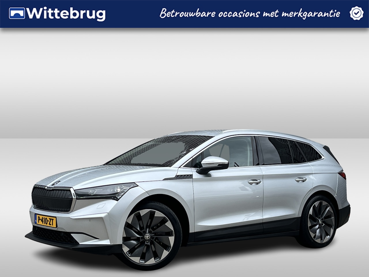 Skoda Enyaq iV - 80 First Edition / Navigatie / Camera / Parkeersensoren V+A / Zwenkbare trekhaak / 21" LMV - AutoWereld.nl